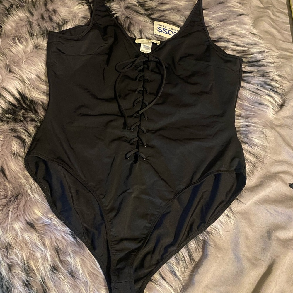 New XL bathing suit black. Nylon/spandex. Never tried on.